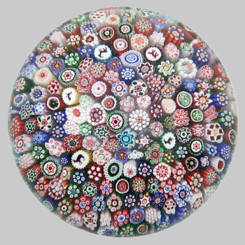 An antique Baccarat closepacked millefiori paperweight.